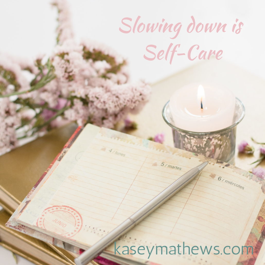 flowers and the phrase slowing down is self-care