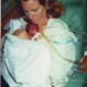 a mother holding a premature baby in honor of world prematurity day